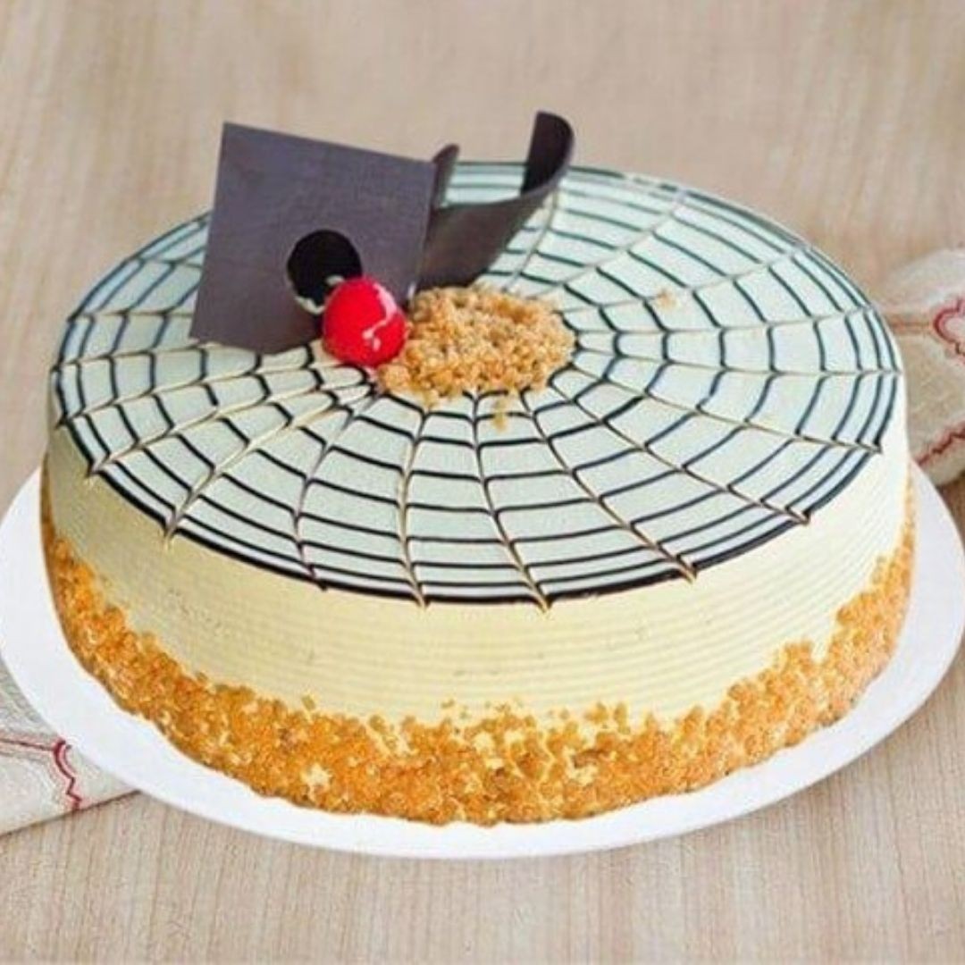 Send Heart Shape Butterscotch Cake 1kg | 99Blooms