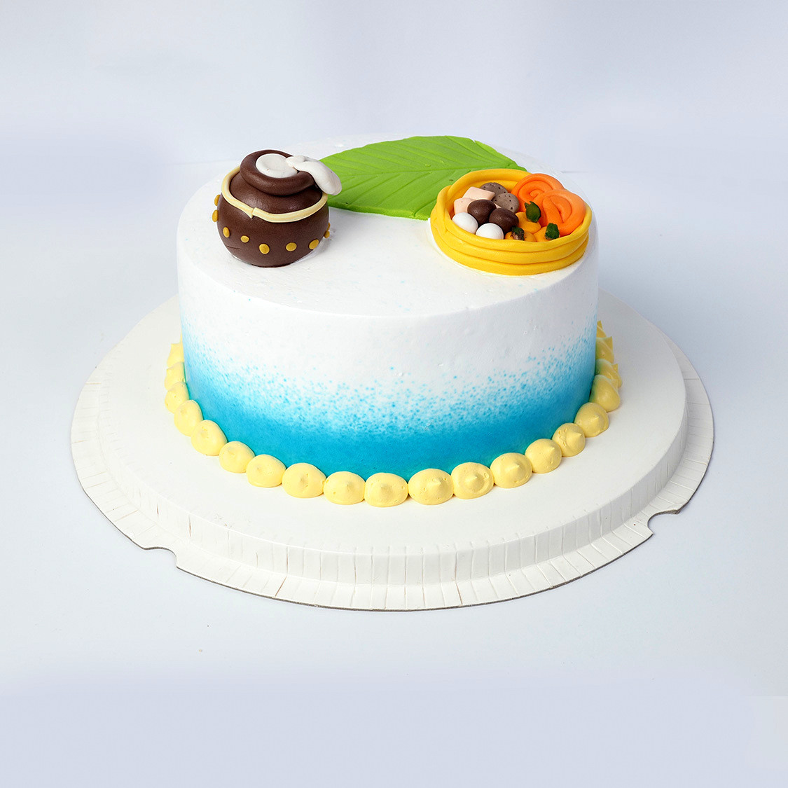 Matka Shape Cream Theme Cake